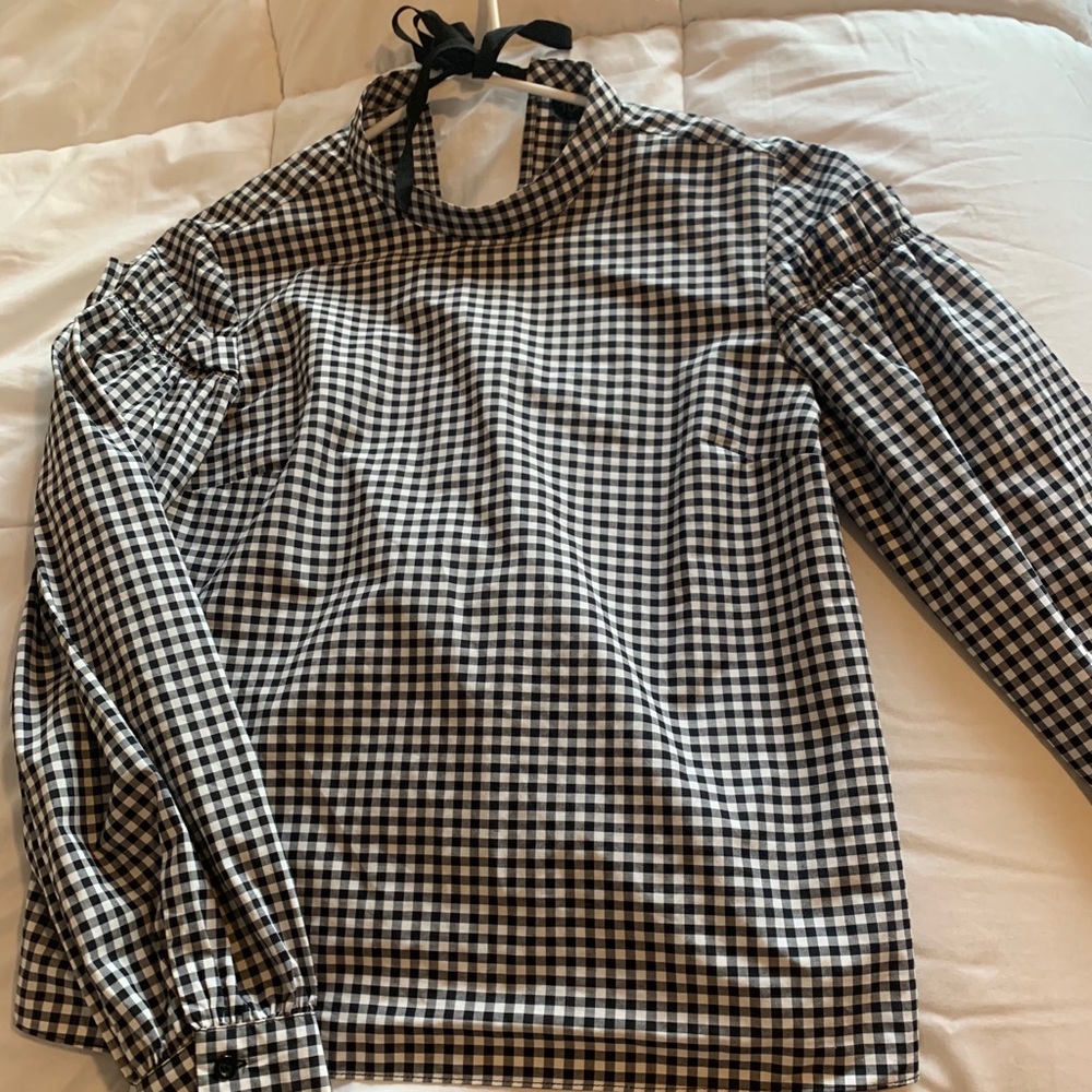 Black and white checkered blouse